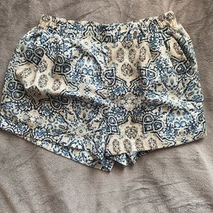 Blue and tan short pockets. Size small.